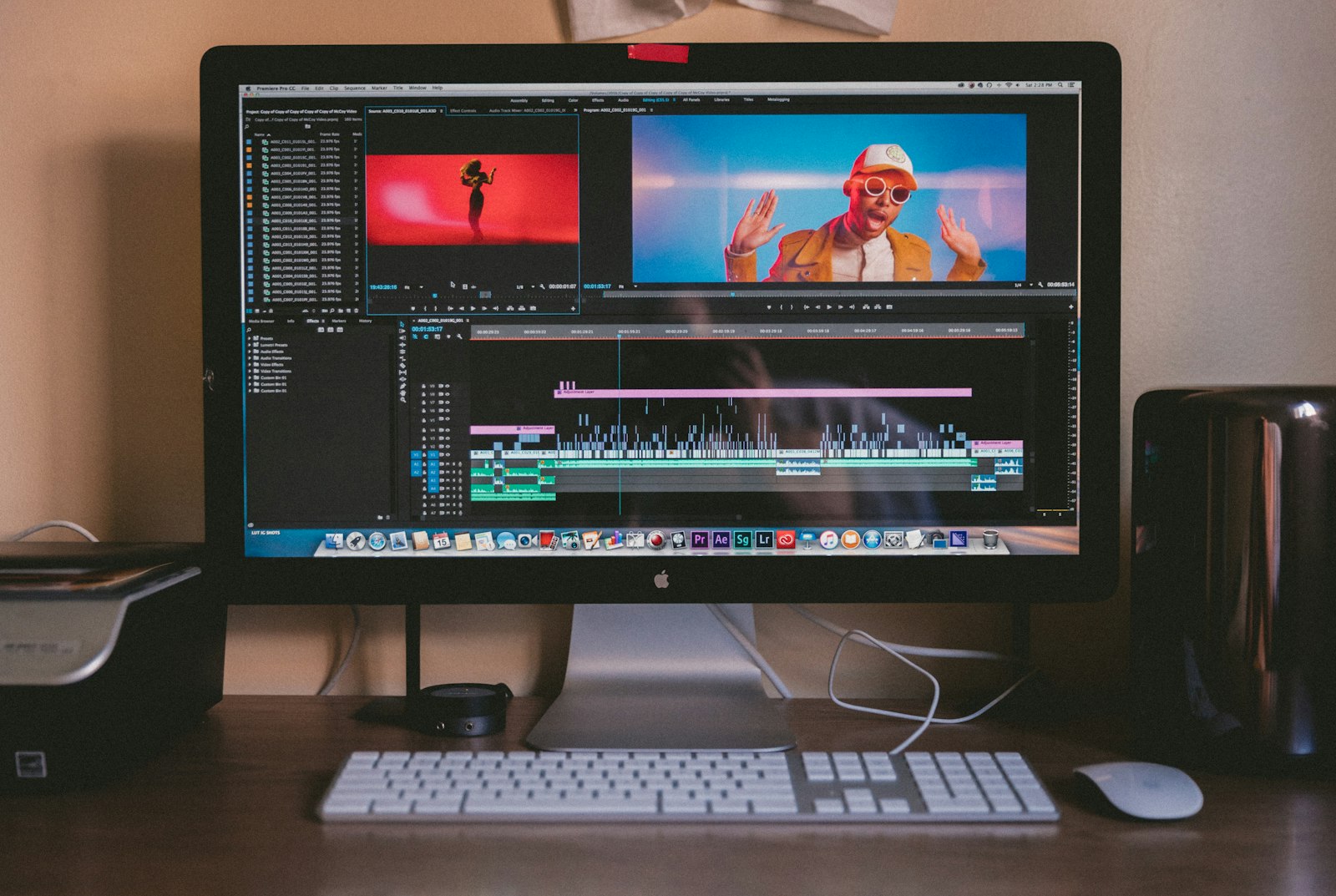 Video review workspace showing source and program monitors with a multi-track timeline.